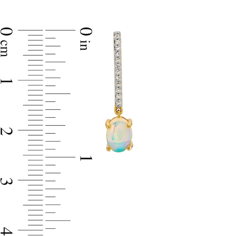 Oval Opal and 1/8 CT. T.W. Diamond Stick Drop Earrings in 10K Gold