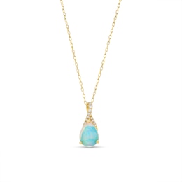 Pear-Shaped Opal and 1/20 CT. T.W. Diamond Ribbon Pendant in 10K Gold