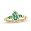 Thumbnail Image 1 of Marquise-Cut Emerald and 1/6 CT. T.W. Diamond Frame Three Stone Ring in 10K Gold