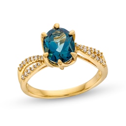 Oval London Blue Topaz and 1/6 CT. T.W. Diamond Bypass Split Shank Ring in 10K Gold
