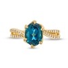 Thumbnail Image 4 of Oval London Blue Topaz and 1/6 CT. T.W. Diamond Bypass Split Shank Ring in 10K Gold