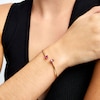 Thumbnail Image 1 of Pear-Shaped Lab-Created Ruby Open Bangle in 10K Gold - 6.75"