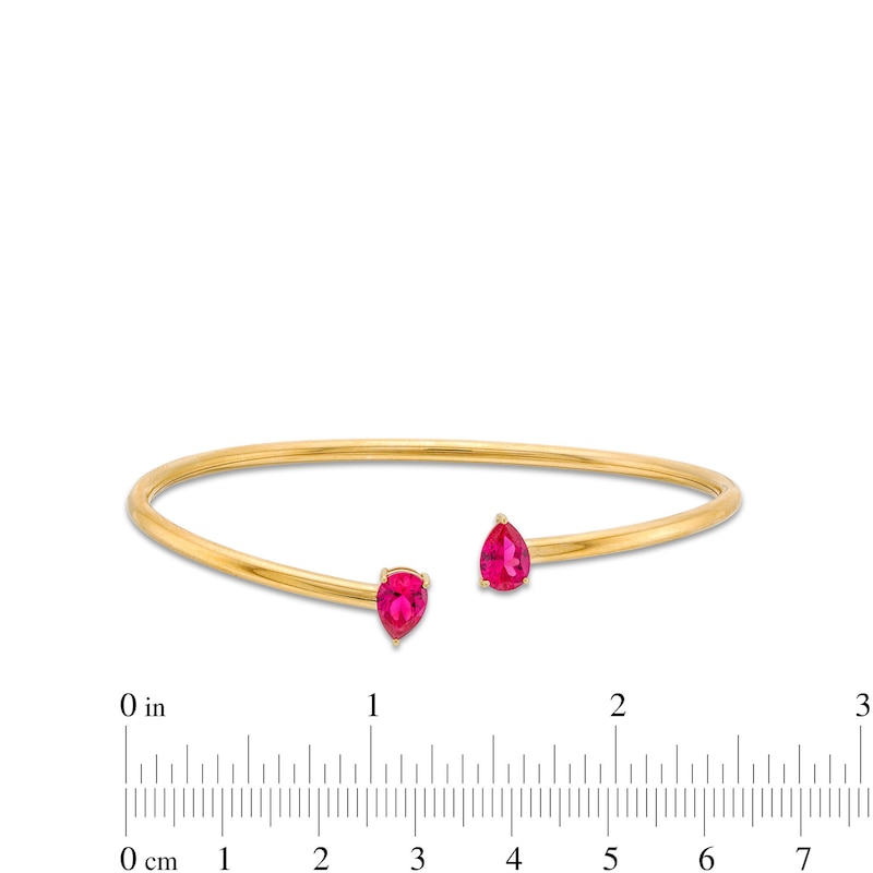 Pear-Shaped Lab-Created Ruby Open Bangle in 10K Gold - 6.75"