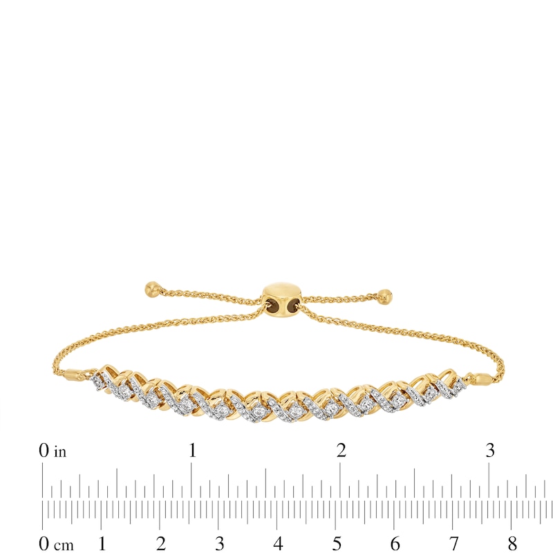 1/2 CT. T.W. Diamond "XO" Alternating Bolo Bracelet in 10K Gold - 9"