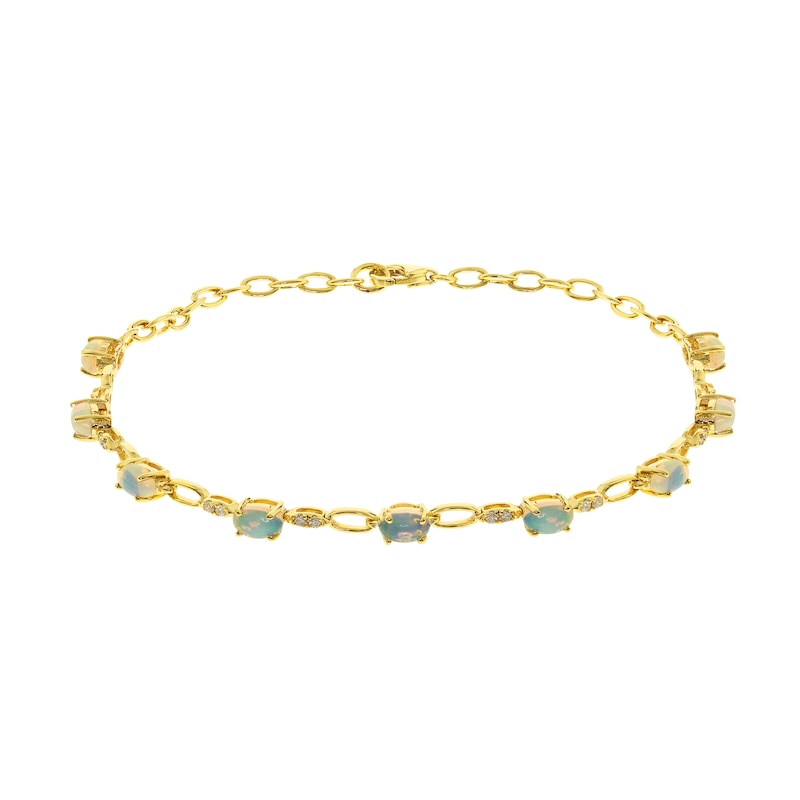 Main Image 1 of Oval-Shaped Opal and 1/8 CT. T.W. Diamond Bracelet in 10K Gold - 7.25&quot;