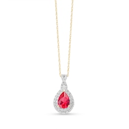 Pear-Shaped Lab-Created Ruby and 1/10 CT. T.W. Diamond Framed Pendant in 10K Gold