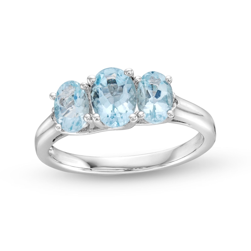 Oval Aquamarine and Diamond Accent Three Stone Ring in Sterling Silver