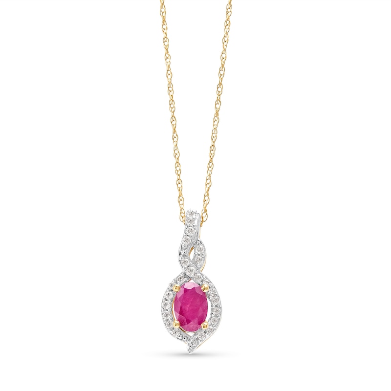 Oval-Shaped Ruby and 1/10 CT. T.W. Diamond Swirl Frame Pendant in 10K Gold