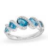 Thumbnail Image 1 of Oval Blue Topaz and White Lab-Created Sapphire Cascading Five Stone Ring in Sterling Silver