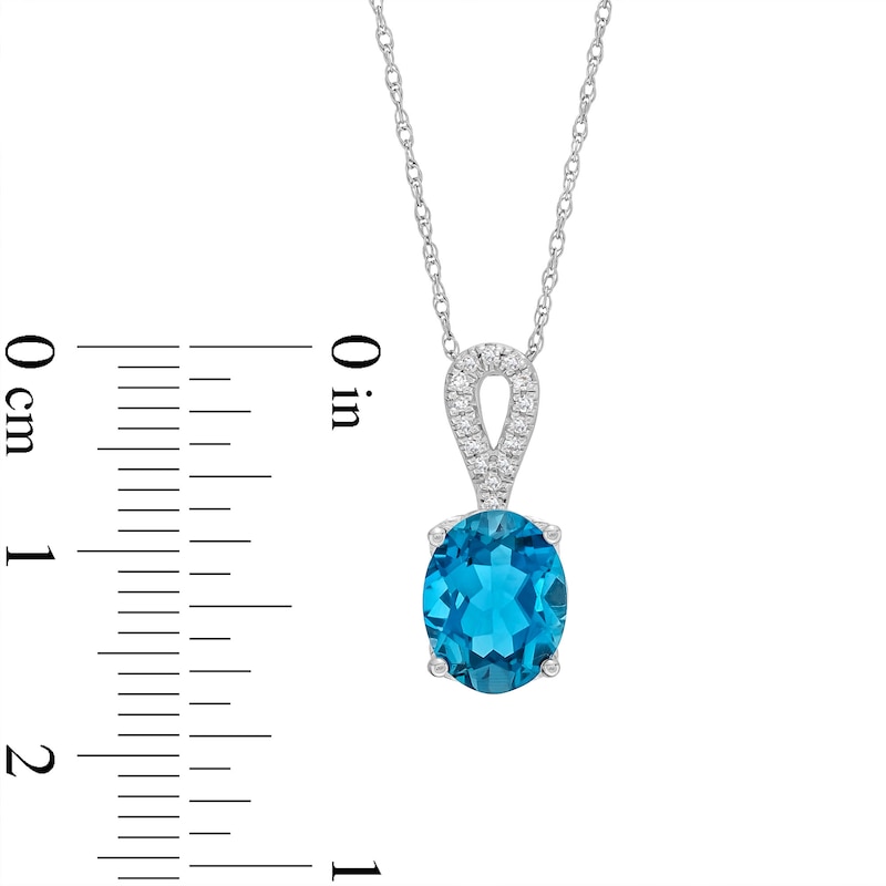Oval London Blue Topaz and Diamond Accent Loop Bail Pendant in 10K White Gold