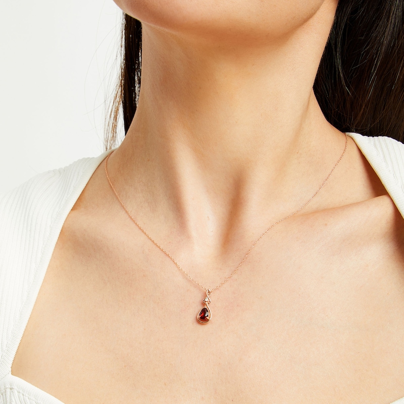 Main Image 2 of Pear-Shaped Garnet and Diamond Accent Open Frame Knot Pendant in 10K Rose Gold