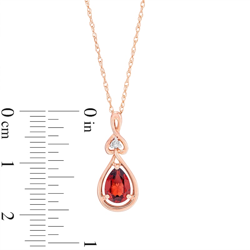 Main Image 3 of Pear-Shaped Garnet and Diamond Accent Open Frame Knot Pendant in 10K Rose Gold