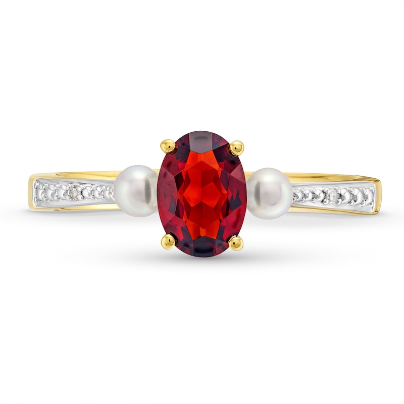 Oval Garnet, Cultured Freshwater Pearl and Diamond Accent Three Stone Ring in 10K Gold