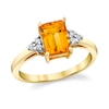 Thumbnail Image 1 of Emerald-Cut Citrine and 1/8 CT. T.W. Diamond Tri-Sides Ring in 14K Gold