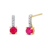 Thumbnail Image 0 of Ruby and 1/20 CT. T.W. Diamond Drop Earrings in 14K Gold