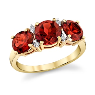 Garnet and 1/20 CT. T.W. Diamond Three Stone Ring in 14K Gold | Zales ...