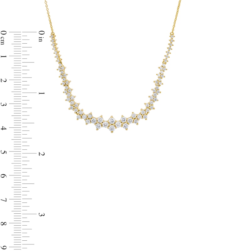 1-1/2 CT. T.W. Diamond Graduated Starburst Necklace in 10K Gold