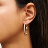 Thumbnail Image 2 of Hollow Diamond-Cut Wave Geometric Hoop Earrings in 14K Gold