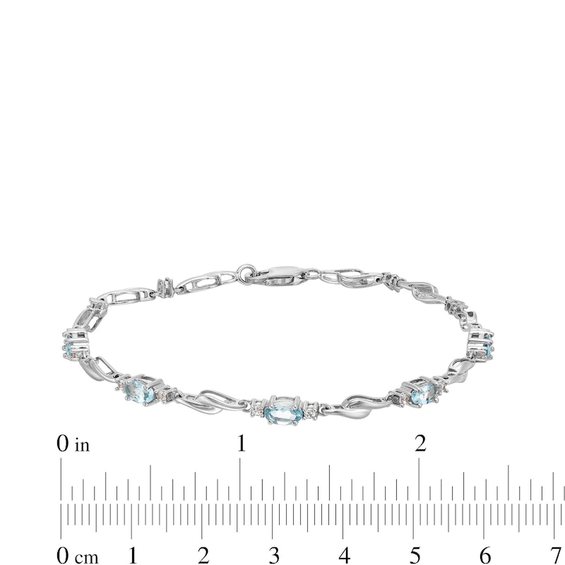 Main Image 4 of Oval Aquamarine and White Lab-Created Sapphire Bypass Link Alternating Bracelet in Sterling Silver - 7.25”