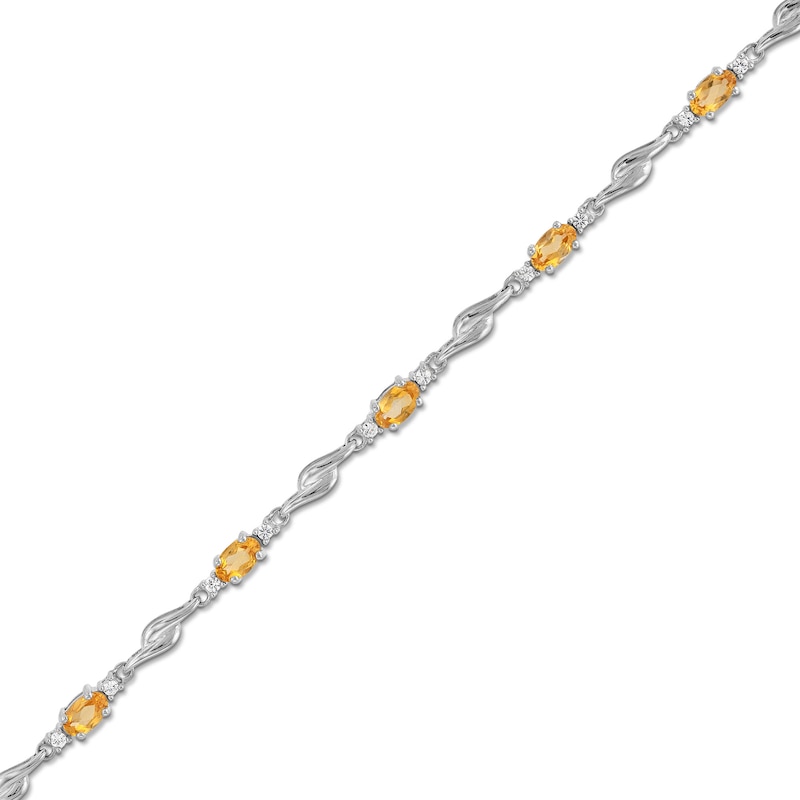 Main Image 1 of Oval Citrine and White Lab-Created Sapphire Bypass Link Alternating Bracelet in Sterling Silver - 7.25”