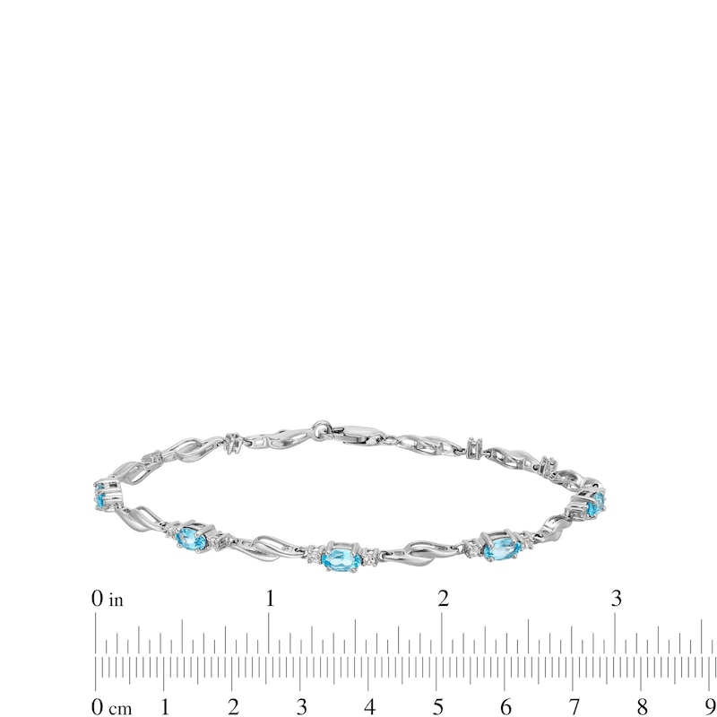 Main Image 4 of Oval Swiss Blue Topaz and White Lab-Created Sapphire Bypass Link Alternating Bracelet in Sterling Silver - 7.25”