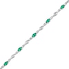 Thumbnail Image 1 of Oval Lab-Created Emerald and White Lab-Created Sapphire Bypass Link Alternating Bracelet in Sterling Silver - 7.25”