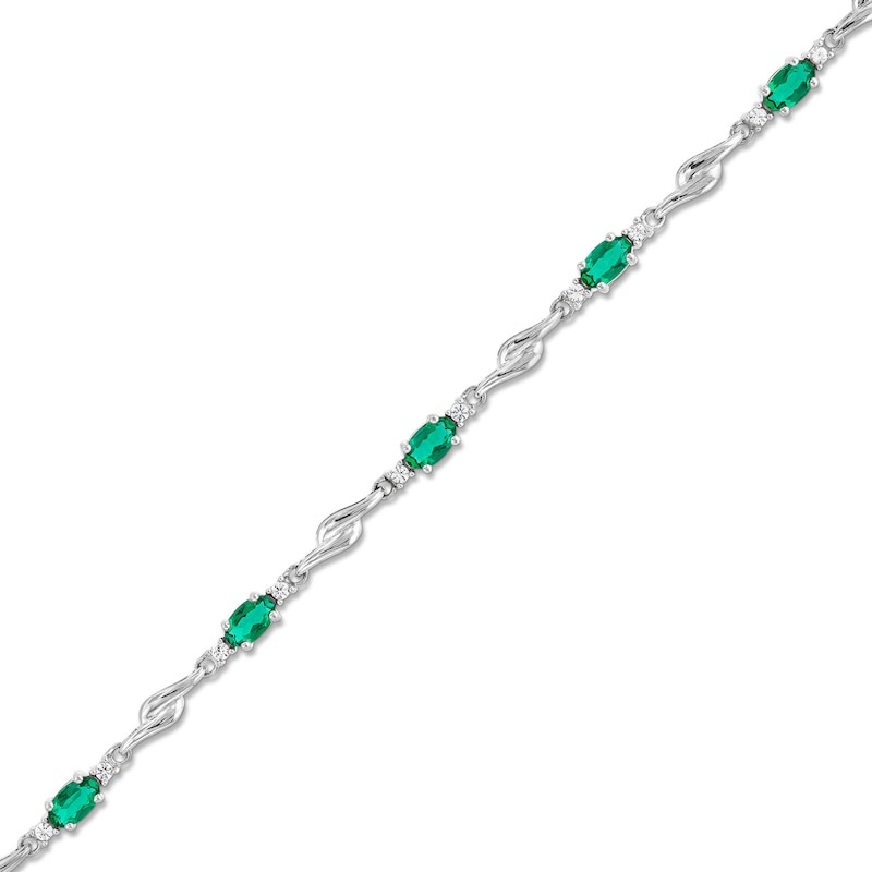 Main Image 1 of Oval Lab-Created Emerald and White Lab-Created Sapphire Bypass Link Alternating Bracelet in Sterling Silver - 7.25”