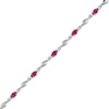 Thumbnail Image 0 of Oval Lab-Created Ruby and White Lab-Created Sapphire Bypass Link Alternating Bracelet in Sterling Silver - 7.25”