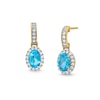 Thumbnail Image 0 of Oval Swiss Blue Topaz and White Lab-Created Sapphire Frame Drop Earrings in 10K Gold