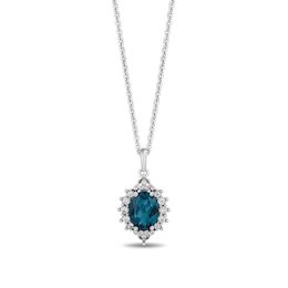 Enchanted Disney Cinderella Oval London Blue Topaz and 1/6 CT. T.W. Diamond Frame Pendant in Sterling Silver - 19”