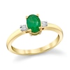 Thumbnail Image 1 of Oval Emerald and 1/20 CT. T.W. Diamond Collar Ring in 10K Gold