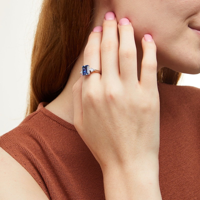 Main Image 2 of Emerald-Cut Blue Lab-Created Sapphire and Kite-Shaped Sky Blue Topaz Three Stone Ring in Sterling Silver