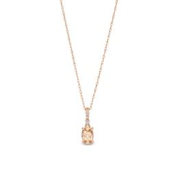 Oval Morganite and 1/20 CT. T.W. Diamond Drop Pendant in 10K Rose Gold