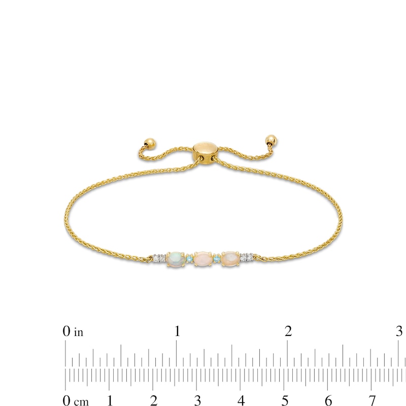 Main Image 3 of Oval Opal and Swiss Blue Topaz with Diamond Accent Bolo Bracelet in 10K Gold - 9.0&quot;