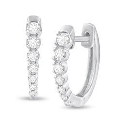 1/4 CT. T.W. Diamond Graduated Seven Stone Hoop Earrings in 10K White Gold