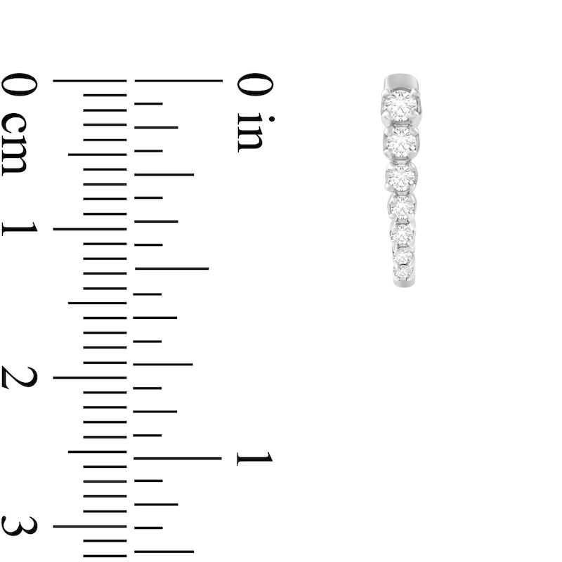 Main Image 2 of 1/4 CT. T.W. Diamond Graduated Seven Stone Hoop Earrings in 10K White Gold