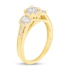 Thumbnail Image 1 of 1/4 CT. T.W. Diamond Frame Three Stone Split Shank Engagement Ring in 10K Gold
