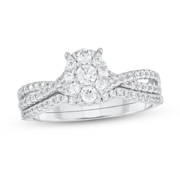 1/2 CT. T.W. Diamond Oval-Shaped Frame Crossover Shank Bridal Set in 10K White Gold