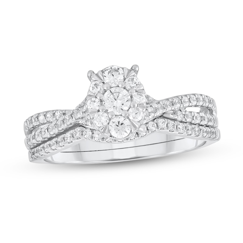 Main Image 1 of 1/2 CT. T.W. Diamond Oval-Shaped Frame Crossover Shank Bridal Set in 10K White Gold