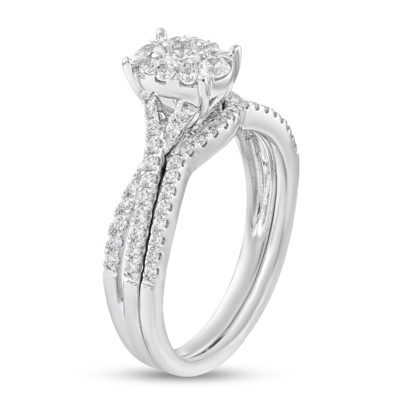 1/2 CT. T.W. Diamond Oval-Shaped Frame Crossover Shank Bridal Set in 10K White Gold