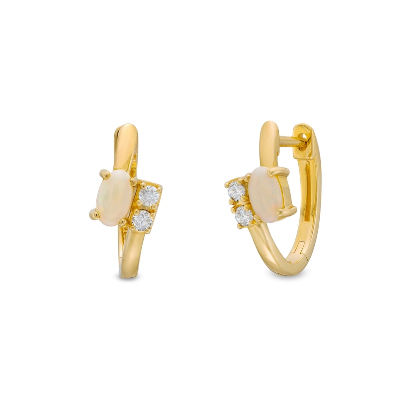 Main Image 1 of Oval Opal and 1/10 CT. T.W. Diamond Bypass Huggie Hoop Earrings in 10K Gold