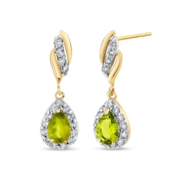 Pear-Shaped Peridot and 1/3 CT. T.W. Diamond Frame Flame Drop Earrings in 14K Gold
