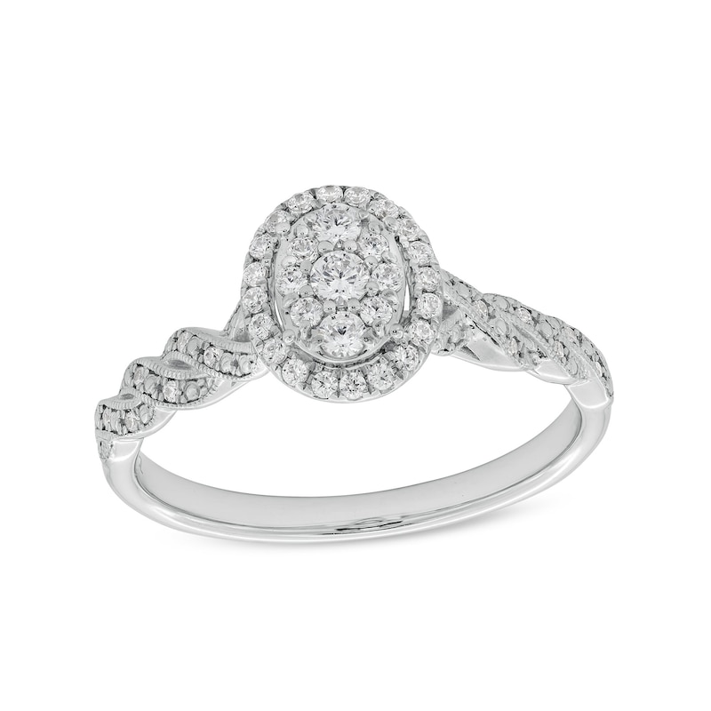 1/4 CT. T.W. Oval-Shaped Multi-Diamond Frame Twist Shank Vintage-Style Promise Ring in 10K White Gold