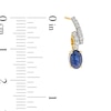 Thumbnail Image 2 of Oval Blue Sapphire and 1/5 CT. T.W. Diamond Twist Drop Earrings in 10K Gold