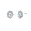 Thumbnail Image 0 of Oval Aquamarine and 1/8 CT. T.W. Diamond Art Deco Vintage-Style Stud Earrings in Sterling Silver