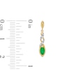 Thumbnail Image 2 of Marquise Emerald and 1/20 CT. T.W. Diamond Twist Drop Earrings in 10K Gold