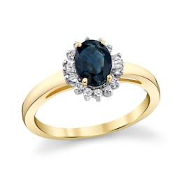 Oval Blue Sapphire and 1/5 CT. T.W. Diamond Alternating Sunburst Frame Ring in 10K Gold