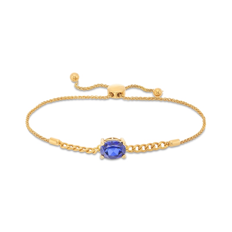 Main Image 1 of Sideways Oval Blue Lab-Created Sapphire Solitaire Cuban Curb Chain Bolo Bracelet in 10K Gold - 8.5&quot;