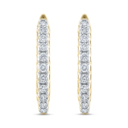 1/2 CT. T.W. Diamond Graduated Oval Hoop Earrings in 10K Gold