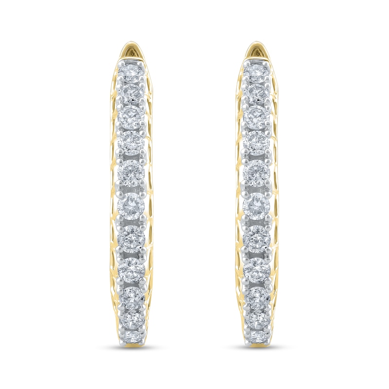 Main Image 1 of 1/2 CT. T.W. Diamond Graduated Oval Hoop Earrings in 10K Gold